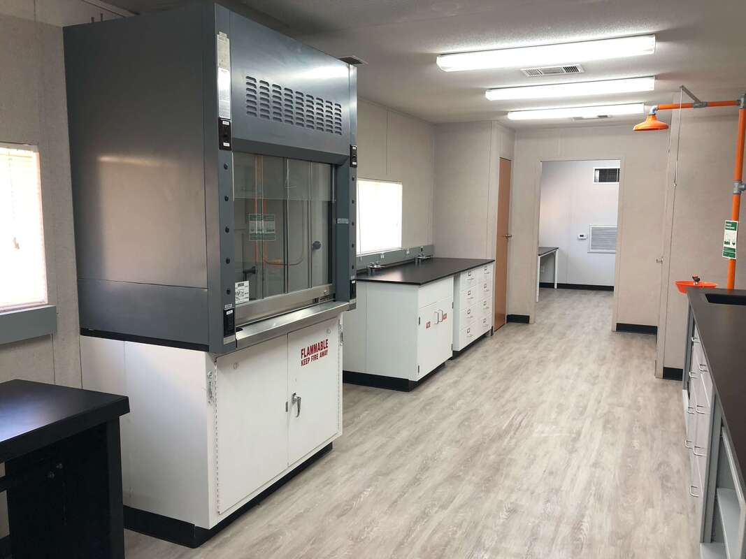 Used fume hoods cabinets counter tops recycled  equipment